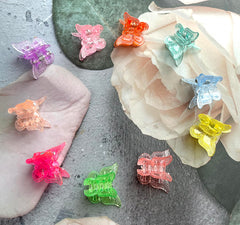 Pinza mariposa mini BEBEEPOO, tamaño compacto para arreglos rápidos.