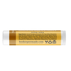Beeswax-based balm with propolis and honey for soothing lips.