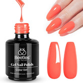 Beetles Coral Orange gel polish bottle closeup showing a peach-orange shade for vibrant nails.