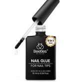 Beetles Gel Polish 9-in-1 bottle pour shows precise application for nails.