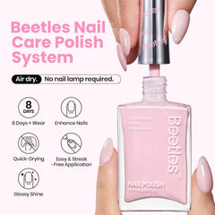 Beetles Light Pink Nail Polish swatch shows soft pastel shade on nail