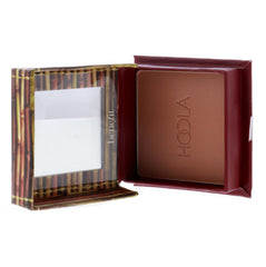 Benefit Hoola bronzer being applied with brush for easy contouring.