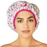 Betty Dain Fashionista Deco Dots shower cap front view protects hair from splashes.