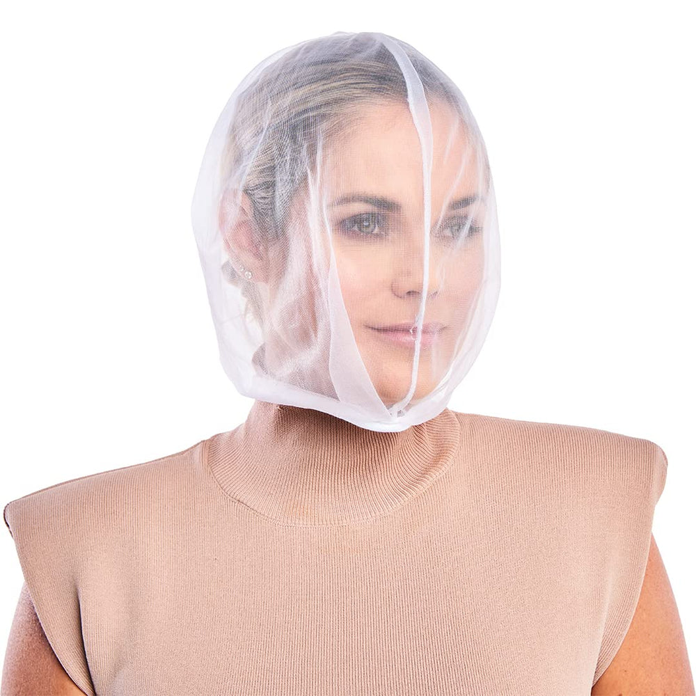 Betty Dain makeup protector hood in white chiffon shields makeup during dressing.