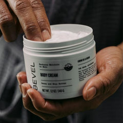 Bevel Body Cream application spread showing smooth texture for daily use.