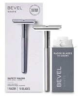 Bevel safety razor with brass weighted handle, close-up showing premium grip.