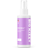 Big Kizzy Remover 2 bottle pour enables easy adhesive removal.