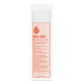 Bio-Oil bottle pouring to show quick absorption and light feel on skin