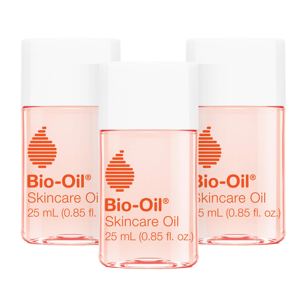 Bio-Oil skincare oil bottle being poured for quick absorption.