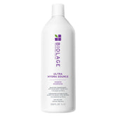 Biolage Ultra Hydra Source Shampoo bottle pouring for deep hydration