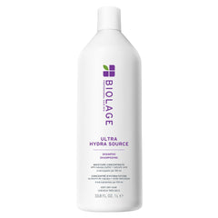 Biolage Ultra Hydra Source Shampoo bottle pouring for deep hydration