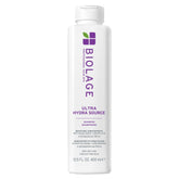 Biolage Ultra Hydra Source shampoo bottle delivers gentle cleansing and deep hydration for dry, coarse hair.