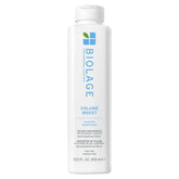 Biolage VolumeBoost Shampoo bottle close-up highlights gentle cleansing for fine hair
