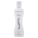 BioSilk Silk Therapy Original bottle pour shows a lightweight leave-in treatment for hair.