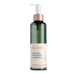 Biossance Squalane + Antioxidant Cleansing Oil bottle on a vanity for makeup removal