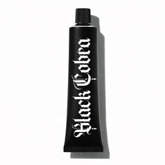 Black Cobra Tattoo Comfort Cream tube close-up, showing compact design ideal for studio prep.