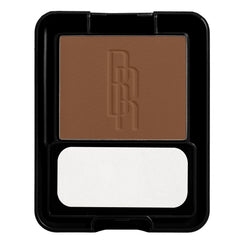 Black Radiance pressed powder with included brush for easy blending.
