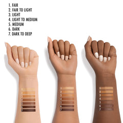 Applying Black Radiance True Complexion Longwear Concealer Light for a seamless blend