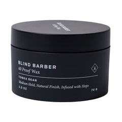 Blind Barber 60 Proof cera para cabello en envase, listo para peinar con acabado natural.