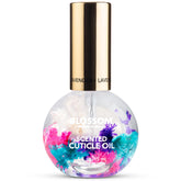 Blossom Cuticle Oil Lavender bottle with real flowers for hydrating nail care