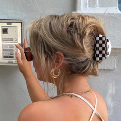 Bmobuo vintage checkered clip rectangle provides reliable grip for updos and casual looks.