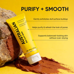 Red clay texture close-up highlights earthy minerals for a purifying clay experience.