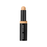 Bobbi Brown Skin Concealer Stick under-eye application for natural brightness.