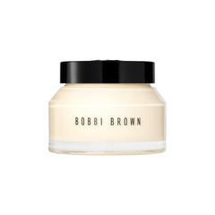 Bobbi Brown Vitamin Enriched Face Base jar closeup shows nourishing hydration for a smooth makeup base