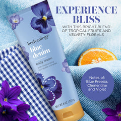 Bodycology Blue Denim cream swirl close-up, suggesting quick absorption and non-greasy feel.