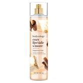 Bodycology Cozy Fireside S'more bottle pour reveals warm, comforting scent.