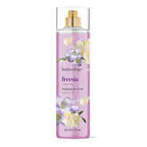 Bodycology Freesia Fragrance Mist bottle highlighting floral notes for everyday elegance.