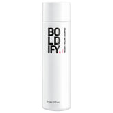 Boldify Champú Engrosador: botella vertida para un lavado limpio y ligero.