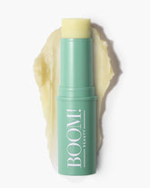 BOOM! Boomstick GLO bottle closeup shows hydrated, natural glow for mature skin.