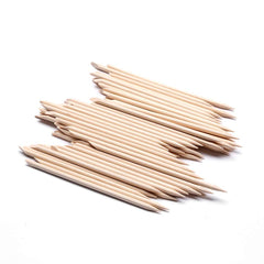 Borogo orange wood nail sticks pointed end cleans around polish during manicures
