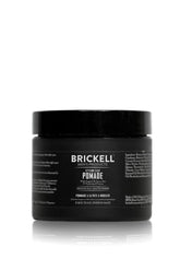 Brickell Hair Styling Clay Pomade tin close-up showing strong hold