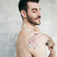 Brickell Men's Invigorating Body Wash close-up of aloe and jojoba.