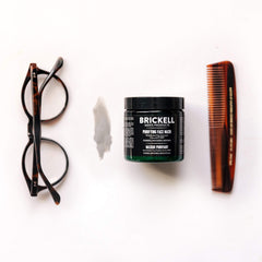 Brickell Men's Purifying Charcoal Face Mask activated charcoal close-up for deep cleansing.
