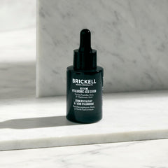 Brickell Serum ingredients peptides vial close-up emphasizing natural formula.