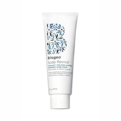 Briogeo Scalp Revival bottle on sink showing detoxifying charcoal and cooling tea tree action