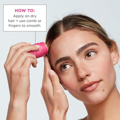 Hair with Briogeo Sleek Stick providing a glossy, polished edge touch-up