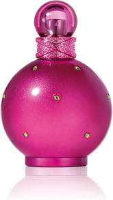 Britney Spears Fantasy bottle on pink glass for an elegant evening vibe