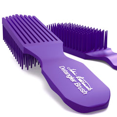 Brush With The Best Purple Detangler Brush close-up highlights flexible bristles for painless detangling.