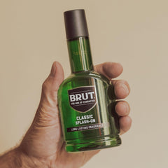 BRUT Splash-On Original fragrance splash captures quick refresh in hand.