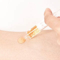 BRÜUN SD serum ampule close-up for brightening and smoothing post-derma-roller sessions