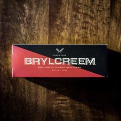 Brylcreem 3-in-1 Original light hold hair cream demonstrates controlled styling