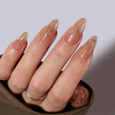 BTArtbox uñas Almond con líneas doradas 3D para un look elegante