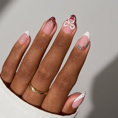 BTArtboxNails salon-grade French-style nails on model hand.