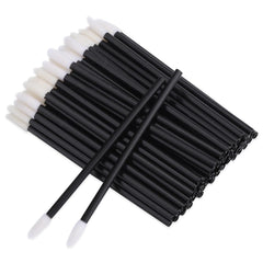BTYMS lip wand with black handle for precise lip gloss application.