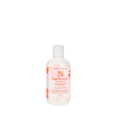 Bumble and bumble Hairdresser's Invisible Oil Hydrating Shampoo bottle highlights lightweight frizz control.