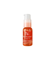 Bumble and bumble Invisible Oil bottle ready for quick frizz control and shine.